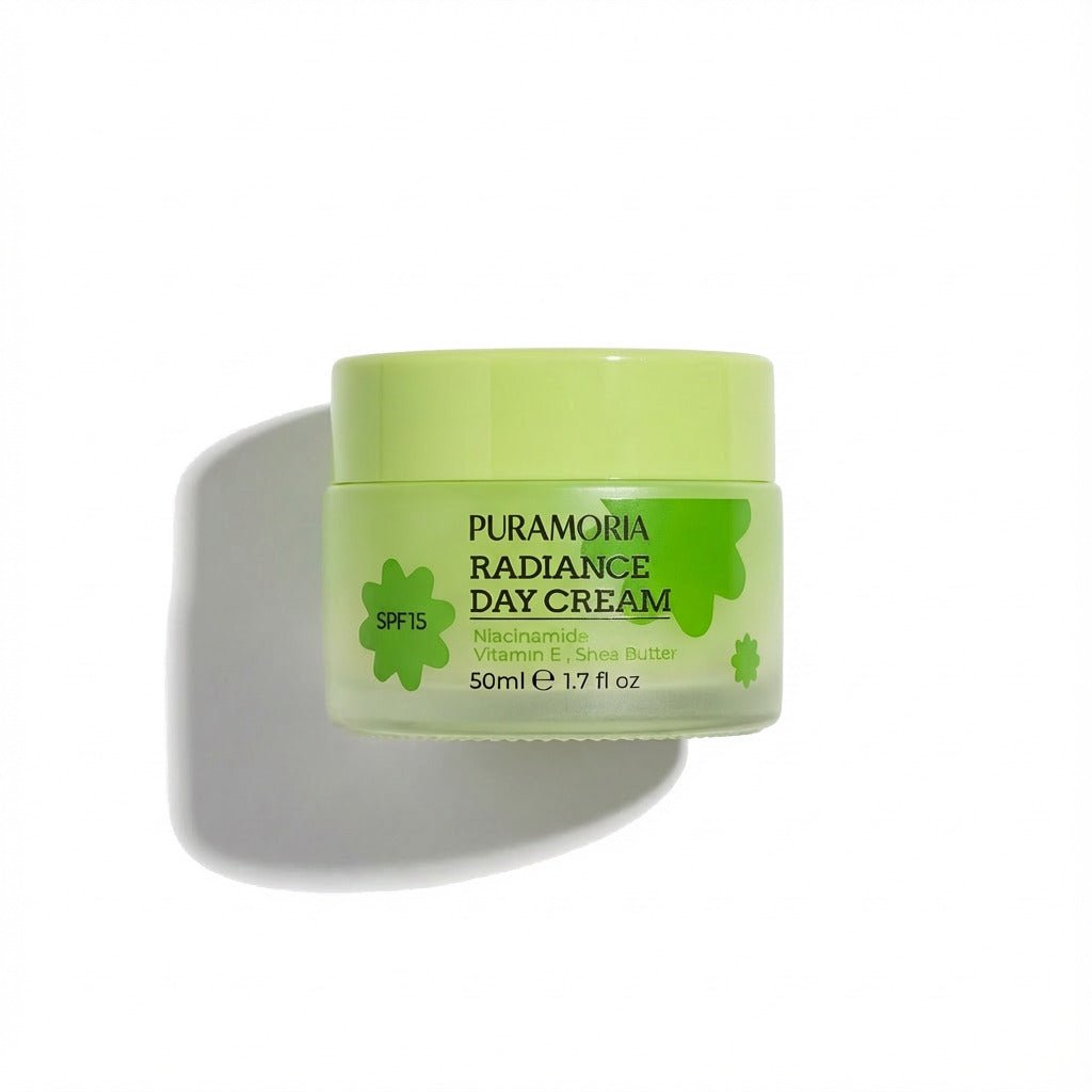 PURAMORIA Radiance Niacinamide Face Cream SPF 15 white pump bottle on a clean background.
