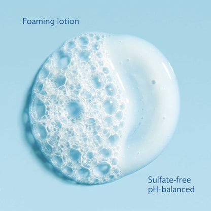 Detailed texture swatch visualization showing clear gel texture of PURAMORIA 1% salicylic acid anti-acne foaming cleanser transforming into dense patches of small bubbles, against a light blue background with visible callout text for 'Foaming lotion', 'Sulfate-free', and 'pH-balanced'